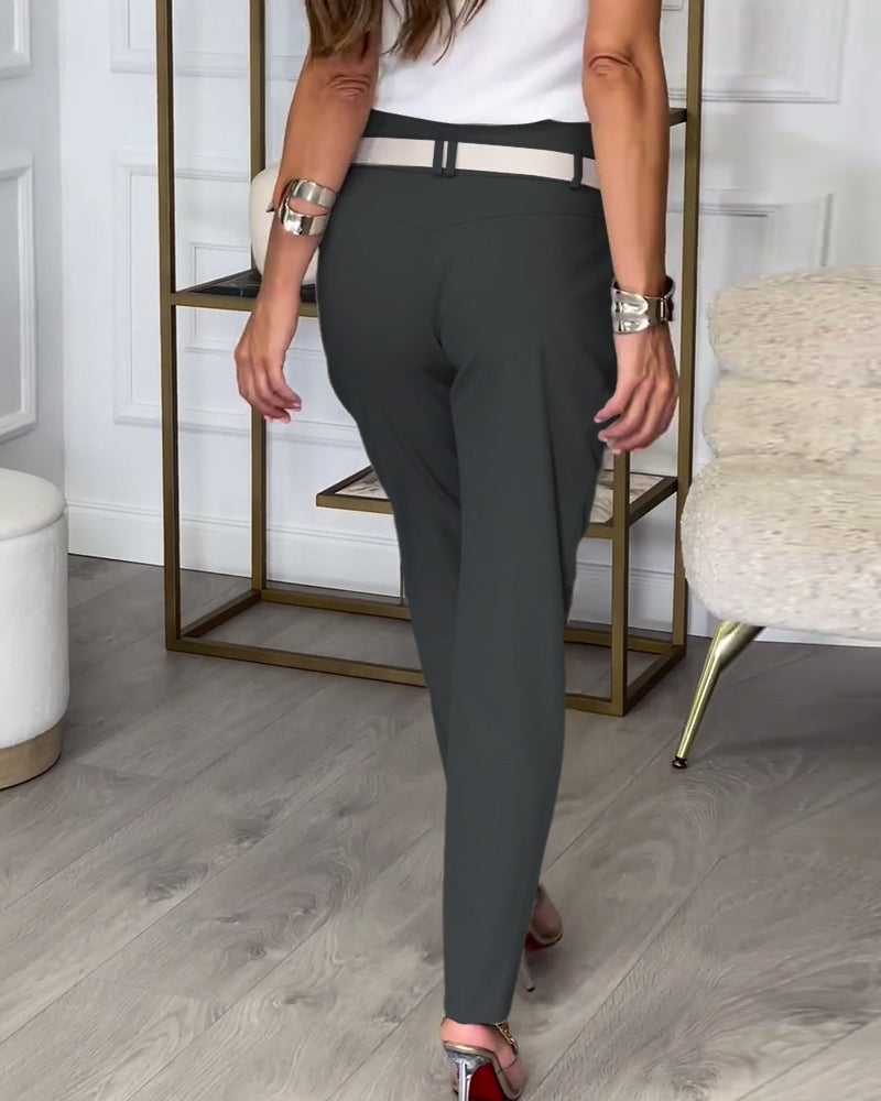 Stijlvolle Effen Broek met Zakjes en Uniek Patchwork Design