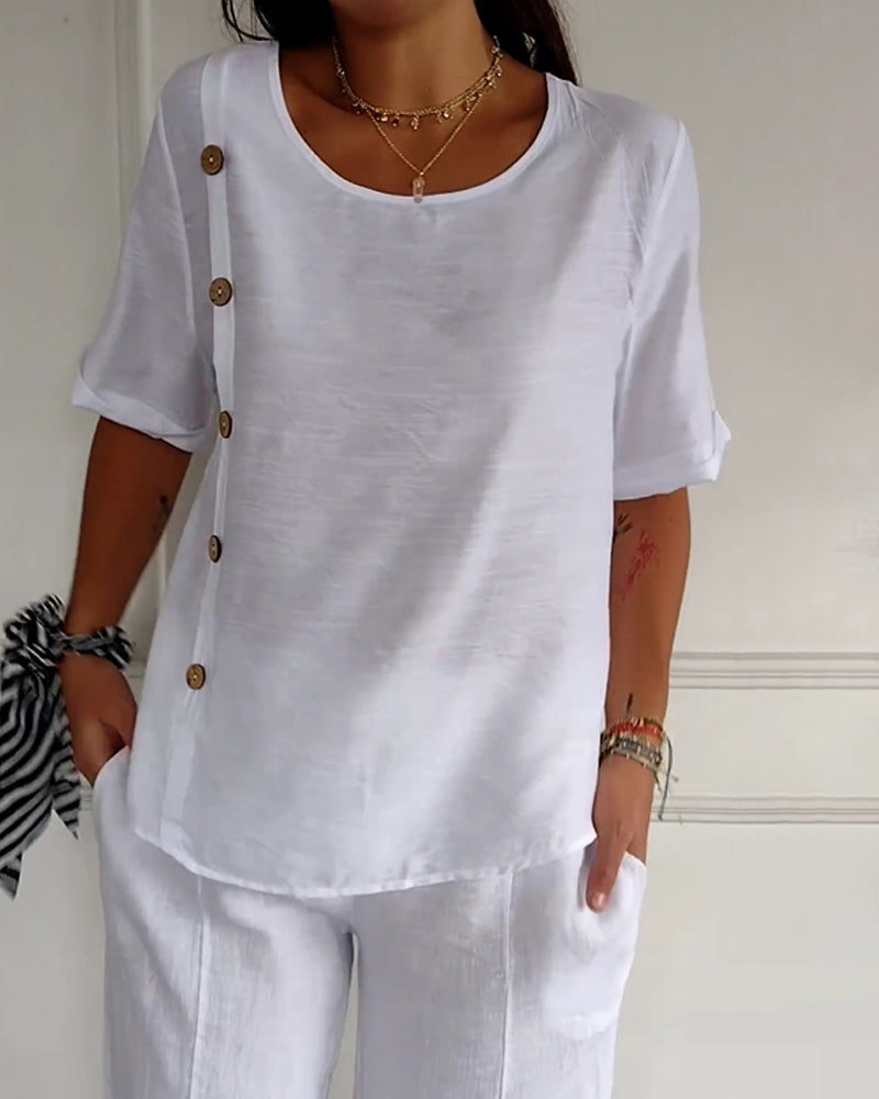 Top van lichte stof met knoopdetails