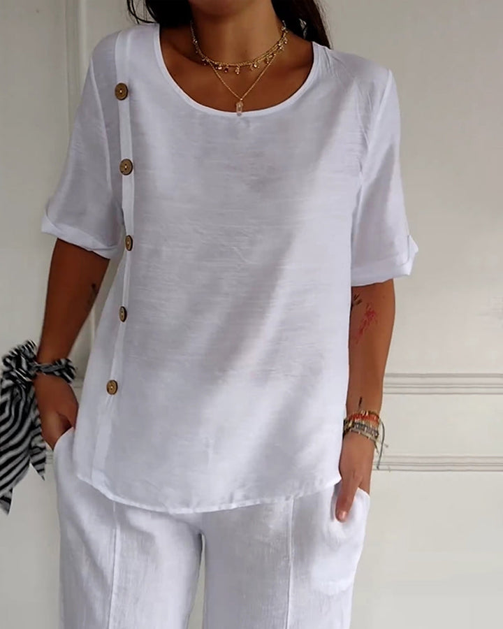 Top van lichte stof met knoopdetails