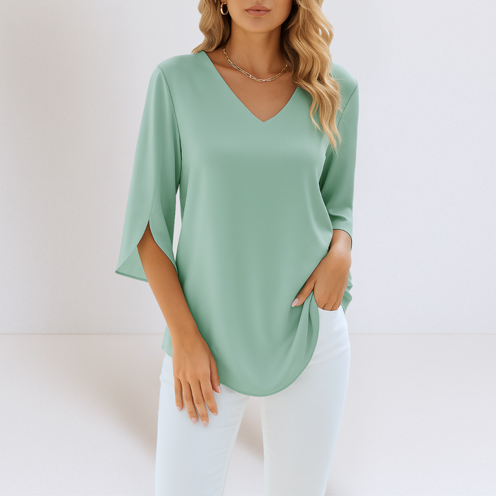 Koelman | Chic Zomerblouse met V-Hals – Licht, Stijlvol & Verfijnd