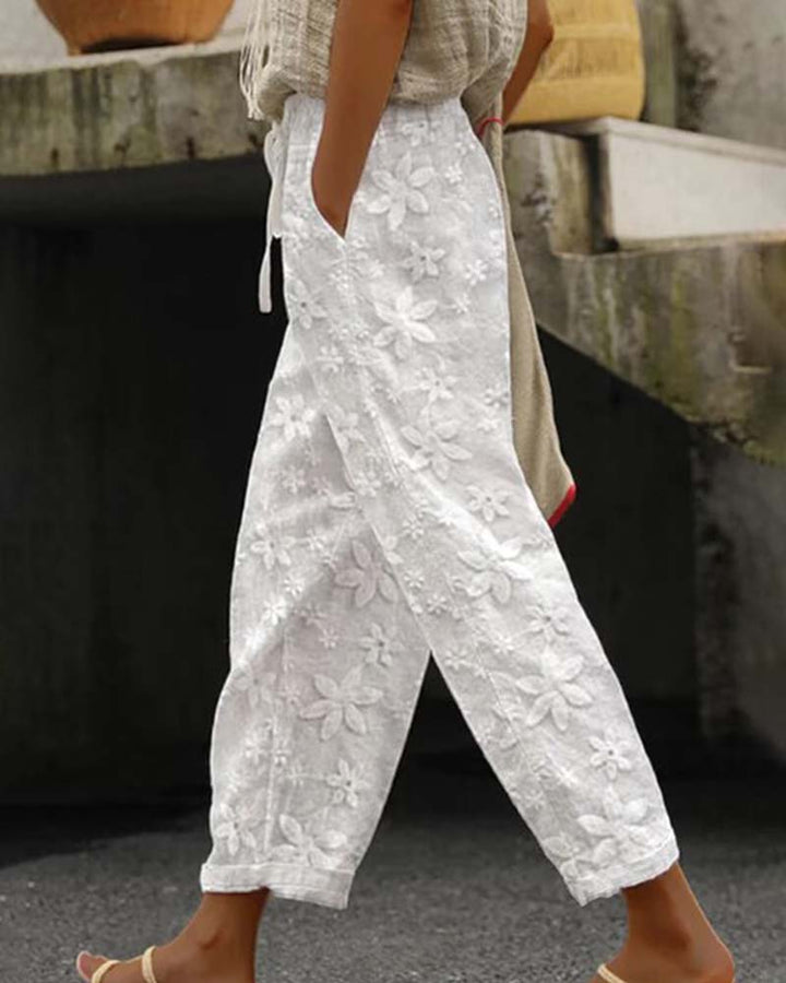 Casual broek met geborduurde bloemen en veters